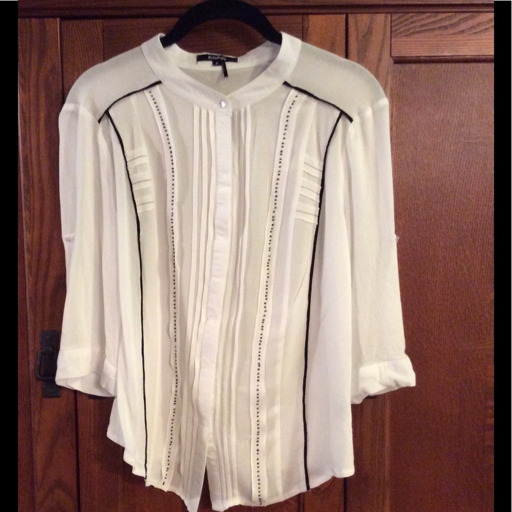 Roly Poly semi sheer blouse with black accents.